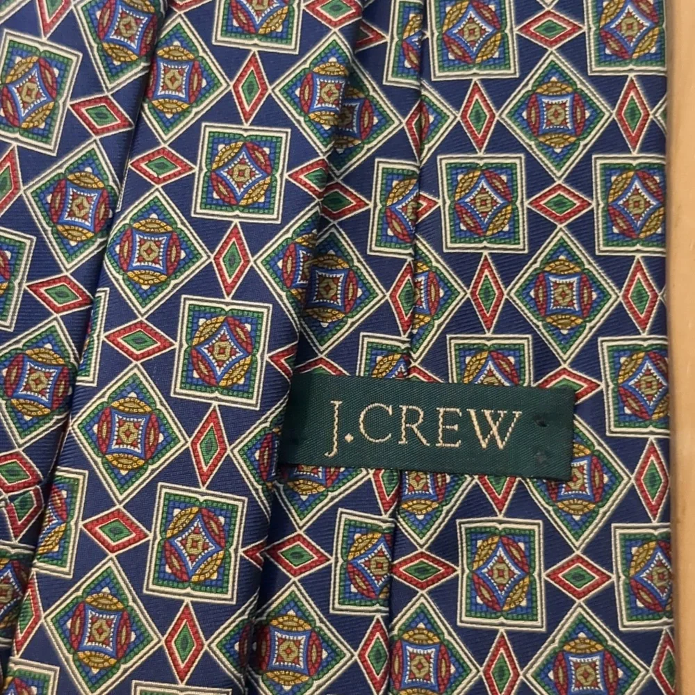 J. Crew 100 percent silk neck tie brown red blue gold Geometric